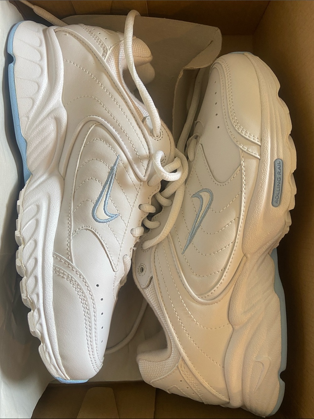 Nike women’s White Leather walking Sneakers with Light Blue Swoosh Accent 8.5